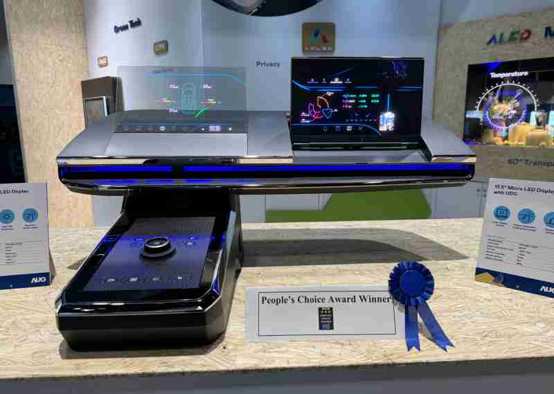 万利车用Micro LED Display HMI解决方案获”最佳车用显示奖”，，，，以用户为中心开发，，，针对前座驾驶与乘客设计兼具娱乐与安全的高画质屏幕，，，，包含车舱前座的Micro LED透明屏幕及全球首款内建镜头的智慧Micro LED显示器